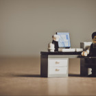 Lego Maennchen am Schreibtisch