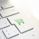 Tastatur mit grüner Shopping-Taste
