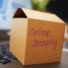 Box mit Aufschrift Online Shopping