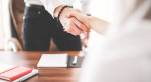 business man and woman handshake in work office picjumbo 612 20250428 203330