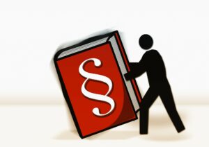 Illustration: Gesetzesbuch mit Paragraphen-Symbol