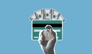 Stoppuhr vor einer Kreditkarte und Dollarscheinen